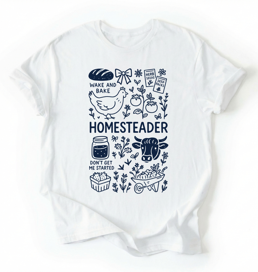 Flat lay of a white homesteader shirt with chicken farm garden and baking icons cottagecore aesthetic gift white t-shirt on a white backgroud