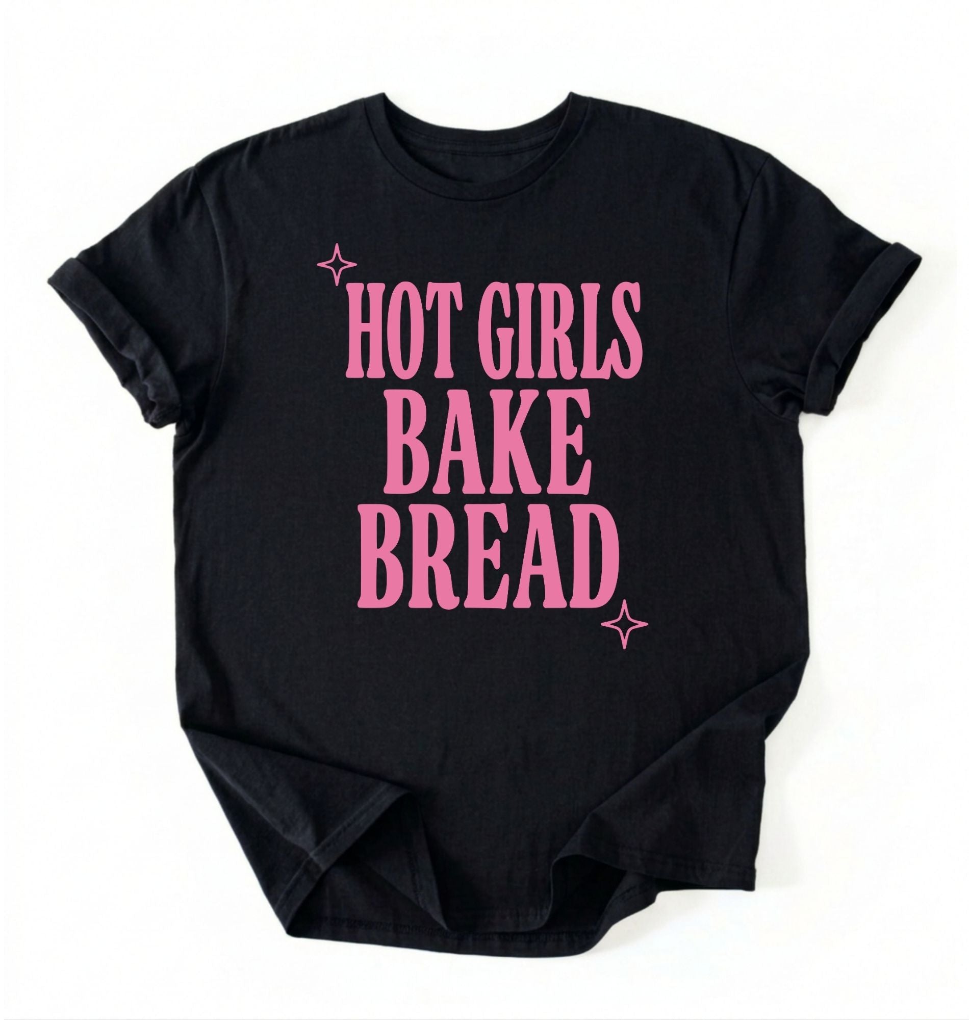 Flat lay of a black hot girls bake bread shirt with pink text funny sourdough baker gift black t-shirt on a white background 