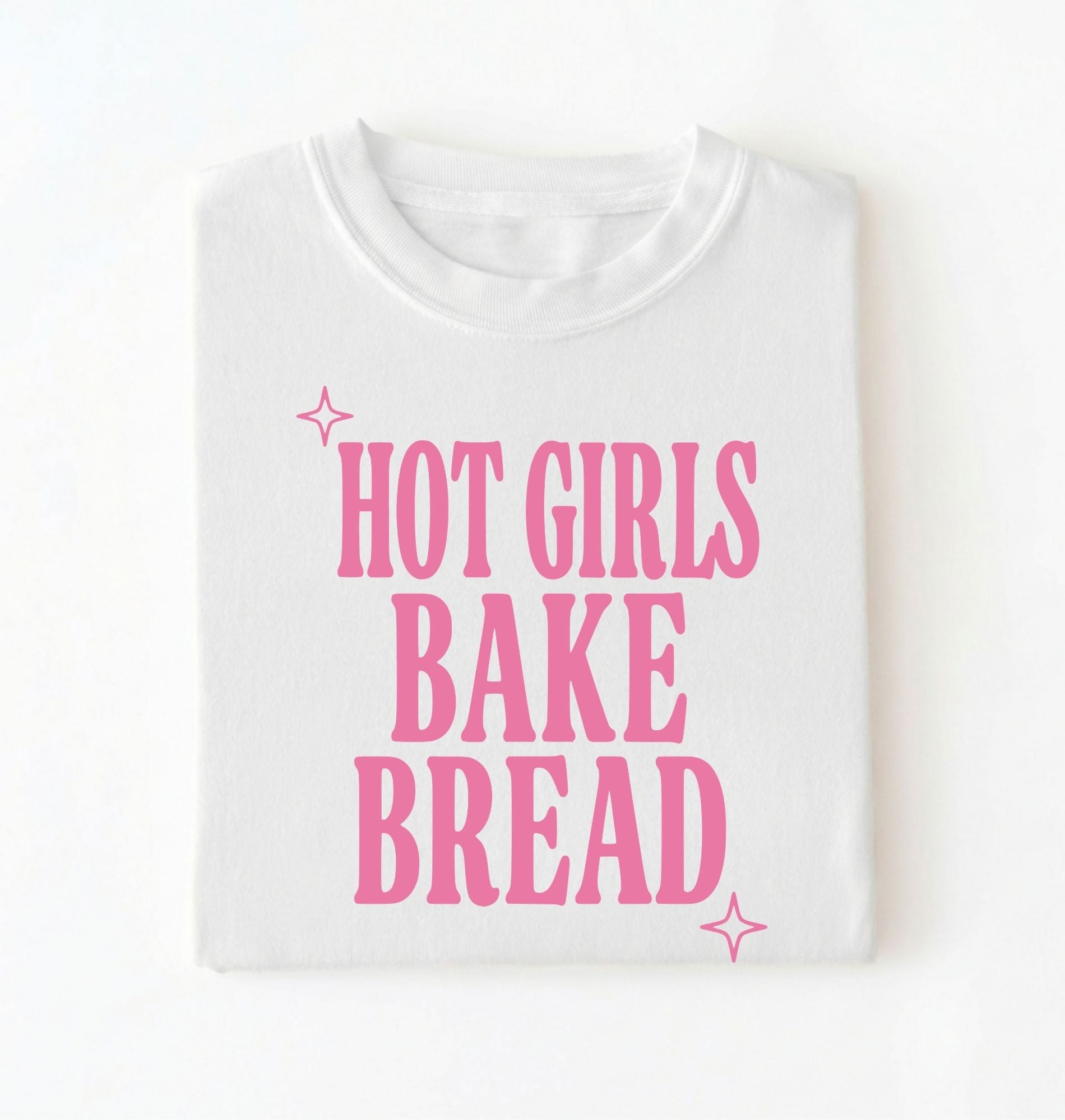 Flat lay of a white hot girls bake bread shirt with pink text funny sourdough baker gift black t-shirt on a white background 