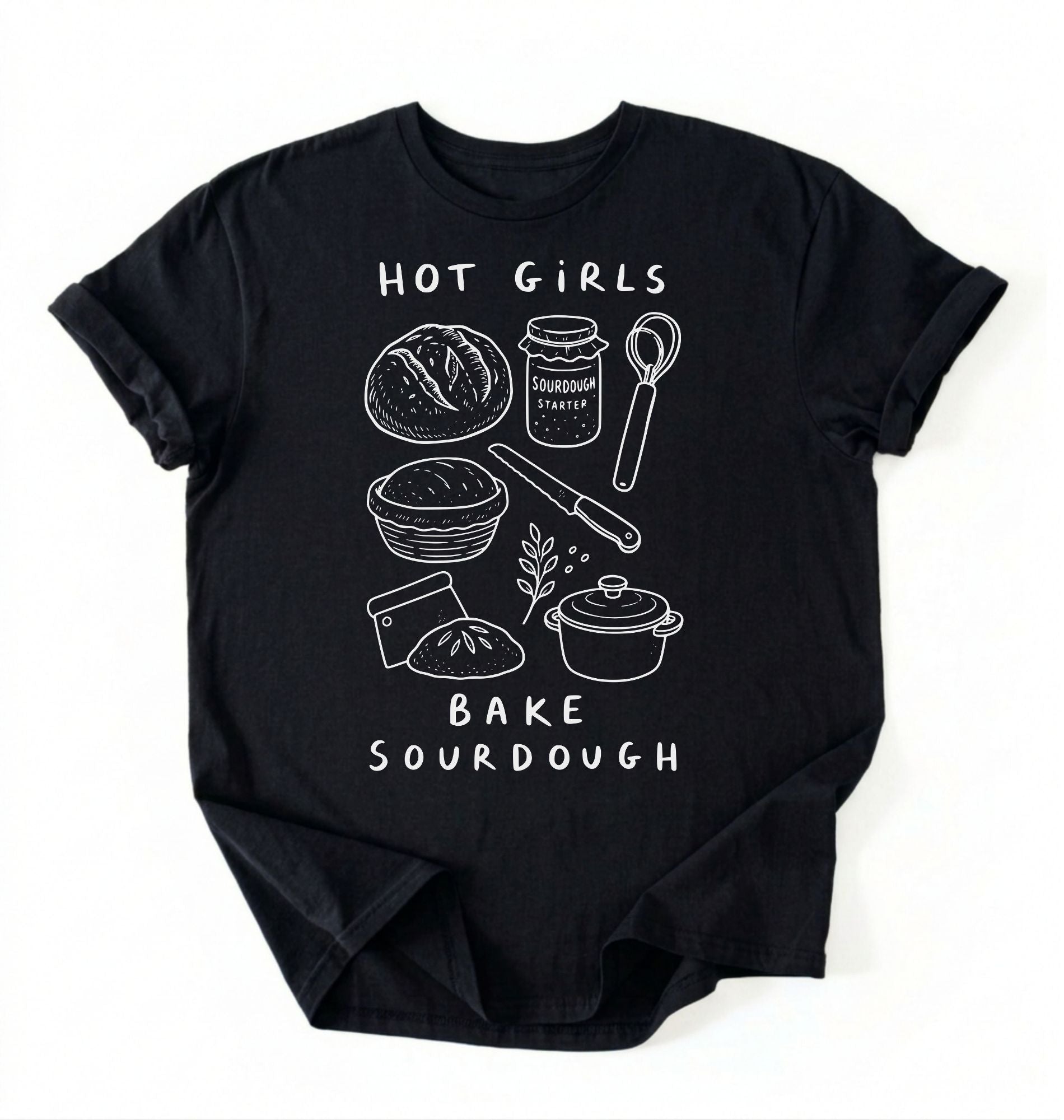 Flat lay of a Funny hot girls bake sourdough shirt with bread and baking tools illustration on black tee on a white background 