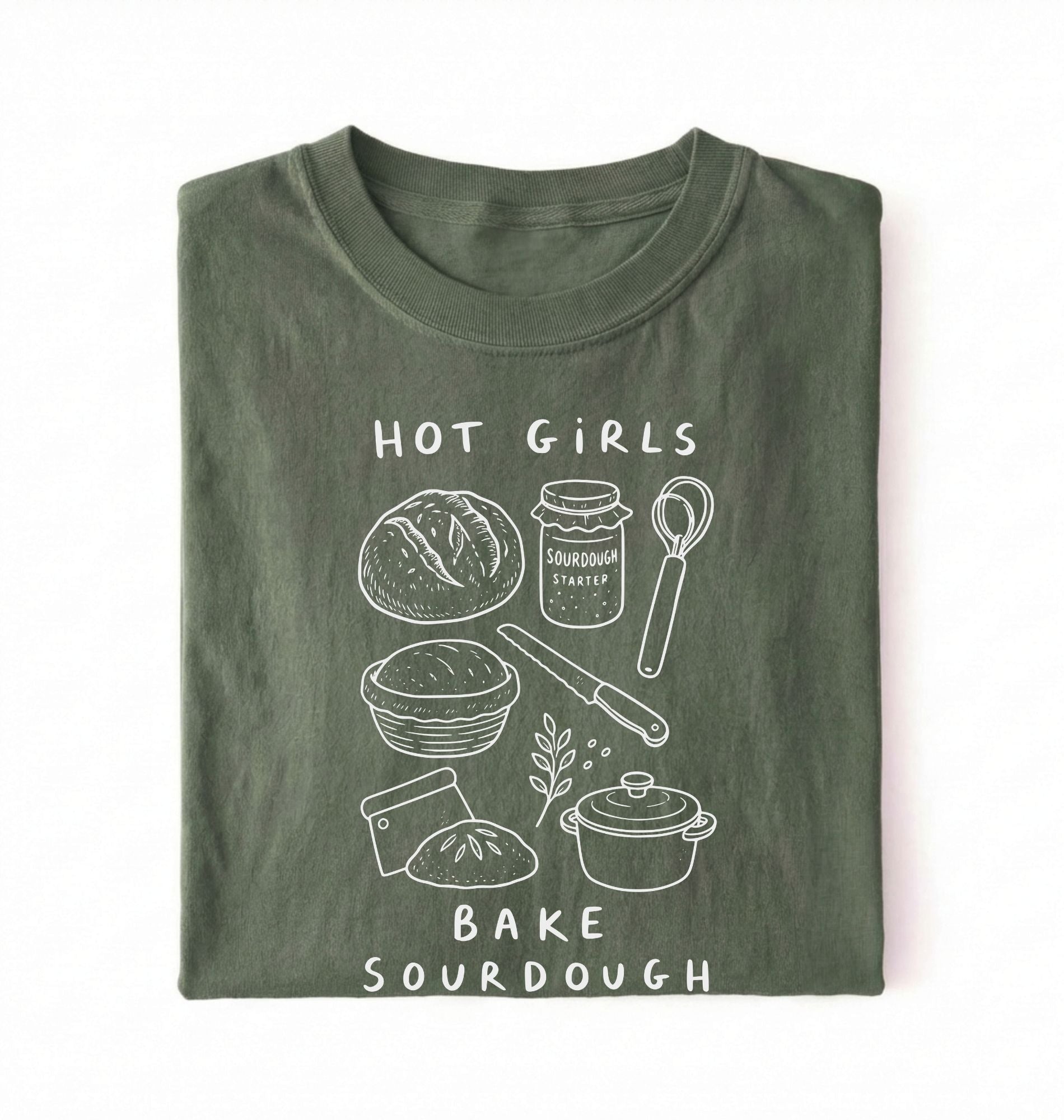 Flat lay of a Funny hot girls bake sourdough shirt with bread and baking tools illustration on green tee on a white background 