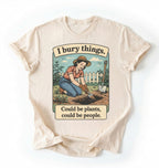 Flat lay of a Natural Funny I bury things gardening shirt with vintage illustration perfect gift for gardeners and plant lovers with humor on a white background