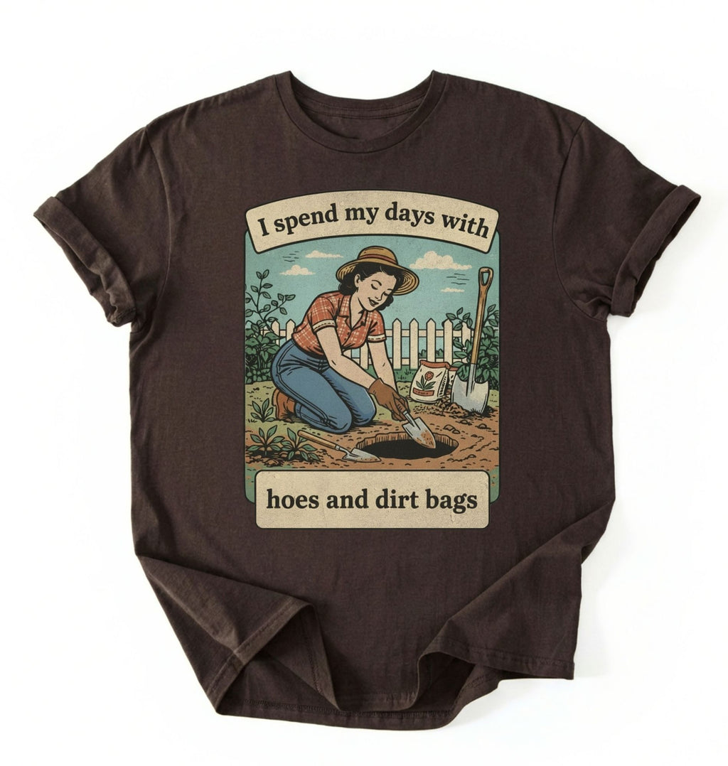 Flat lay of a dark chocolate Funny gardening shirt with hoes and dirt bags text perfect for gardeners and plant lovers with humor on a white background