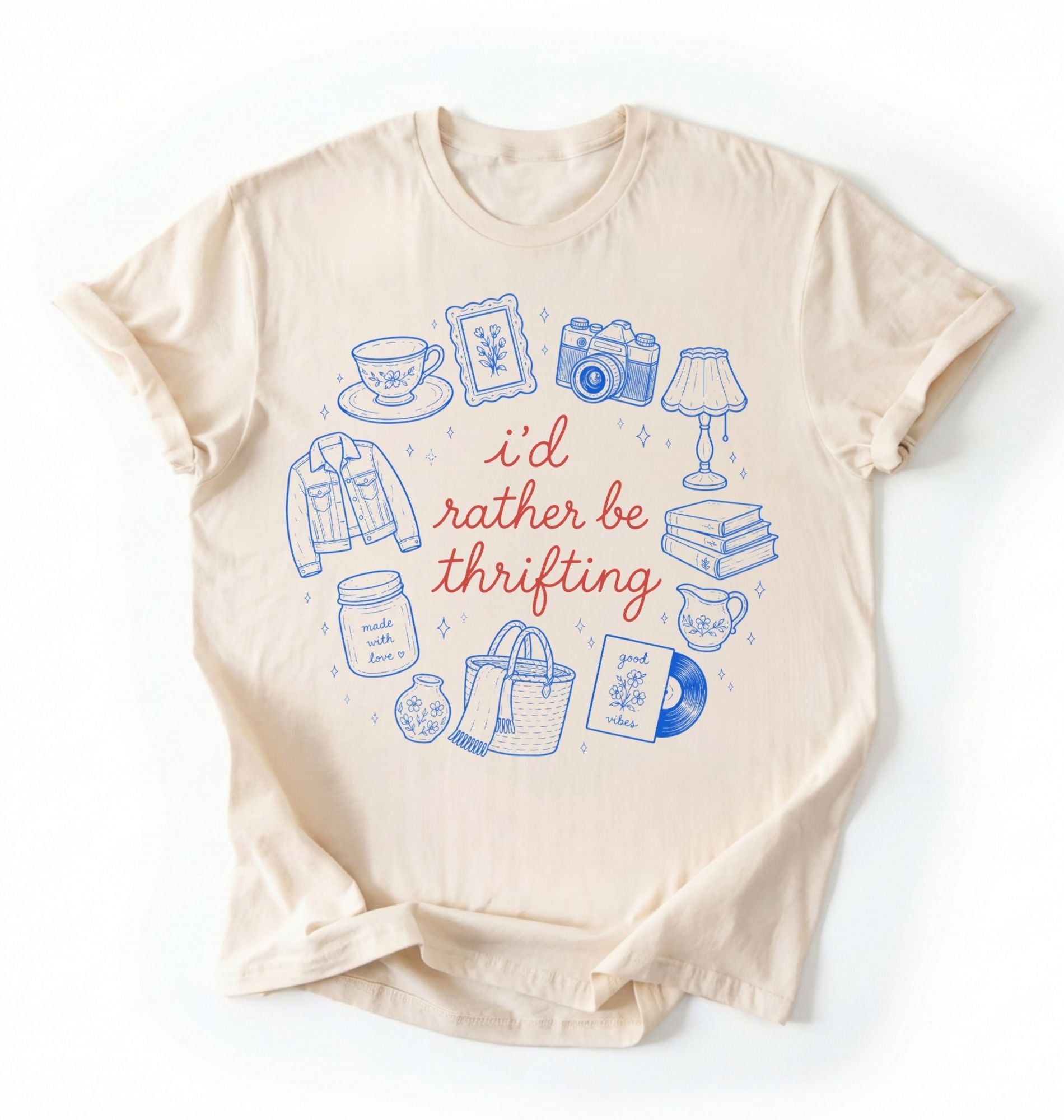 Flat lay of a natural id rather be thrifting shirt cream cute vintage thrift lover t shirt retro aesthetic gift on a white background 