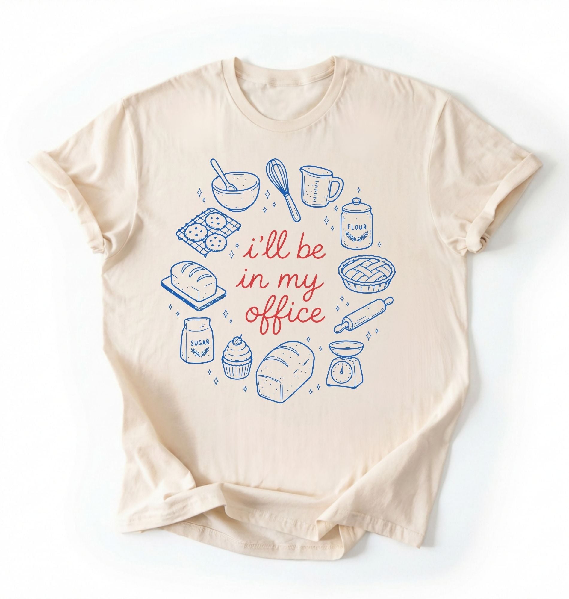 Flat lay of a Funny baking shirt with bread pie cupcake and baking tools illustration on cream tee on a white background 