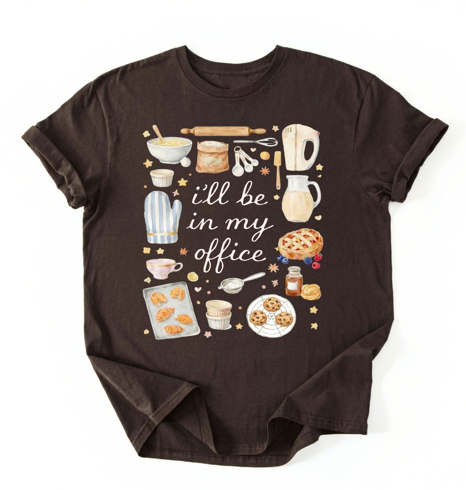 Flat lay of a darkchocolate Baking shirt with tools and desserts saying ill be in my office perfect gift for bakers and home baking lovers on a white background
