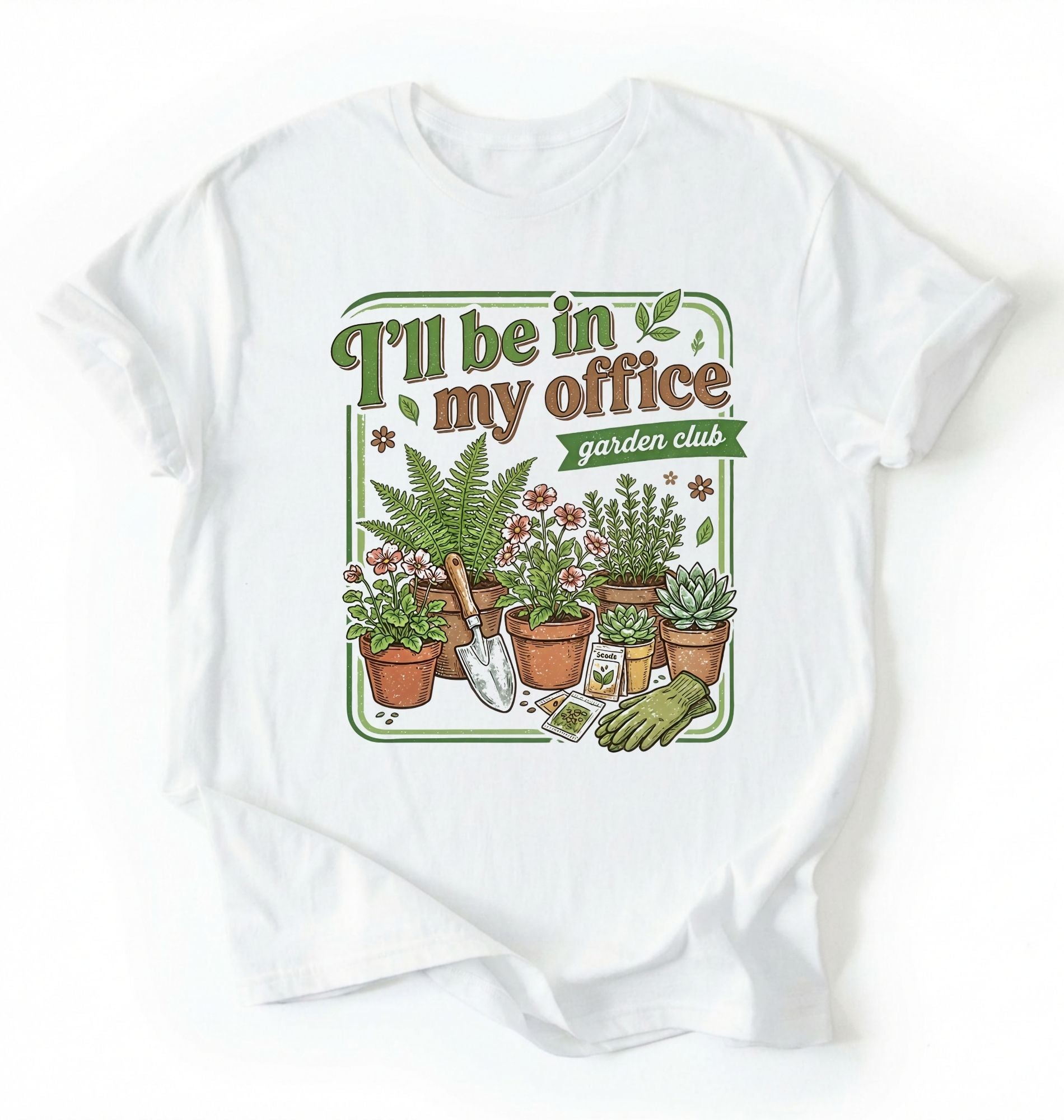 Flat lay of a white t-shirt featuring illustrated potted plants, tools, and text reading “I’ll Be In My Office Garden Club on a white background