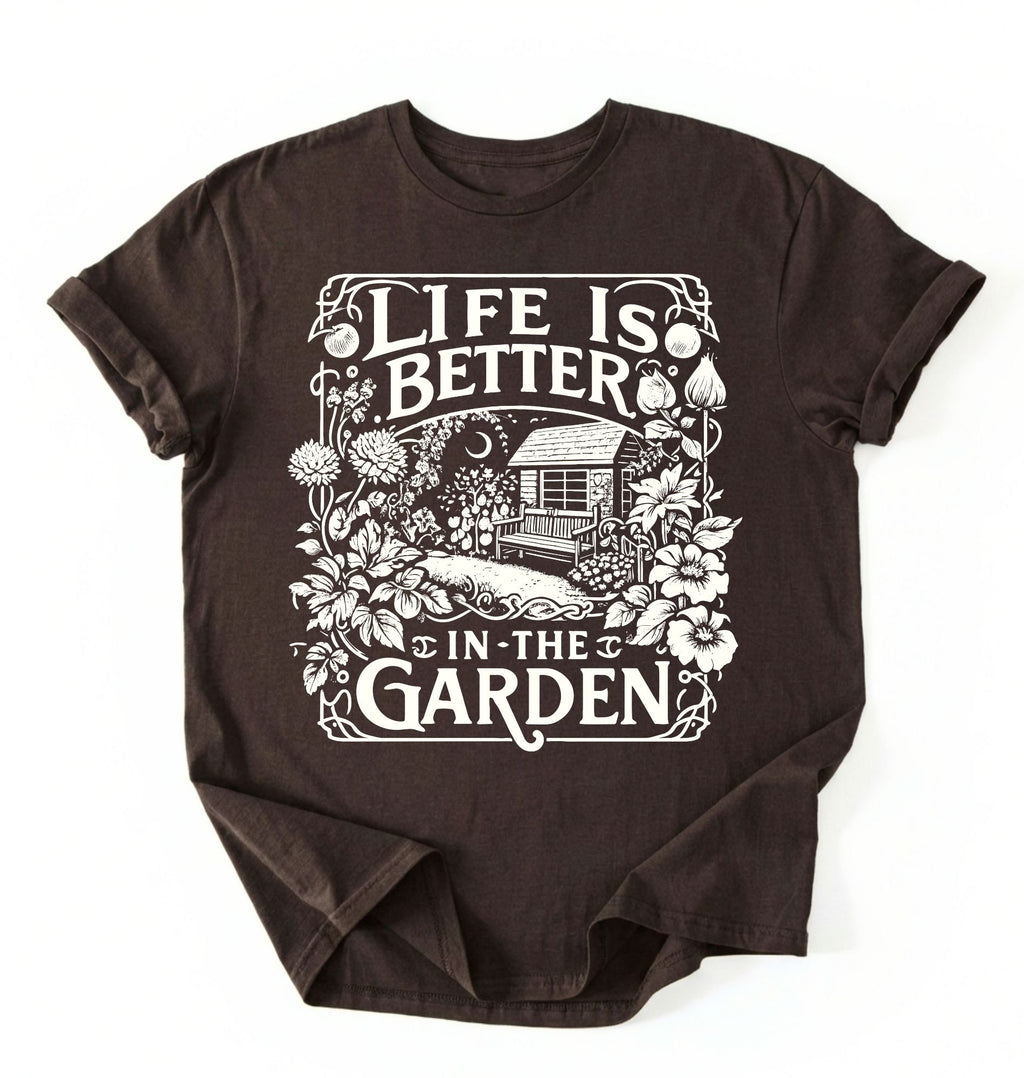 Flat lay of a dark_chocolate shirt written Life is better in the garden cottagecore t-shirt with vintage floral garden illustration, perfect gardener gift on a white background