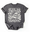 Flat lay of a Charcoal shirt written Life is better in the garden cottagecore t-shirt with vintage floral garden illustration, perfect gardener gift on a white background