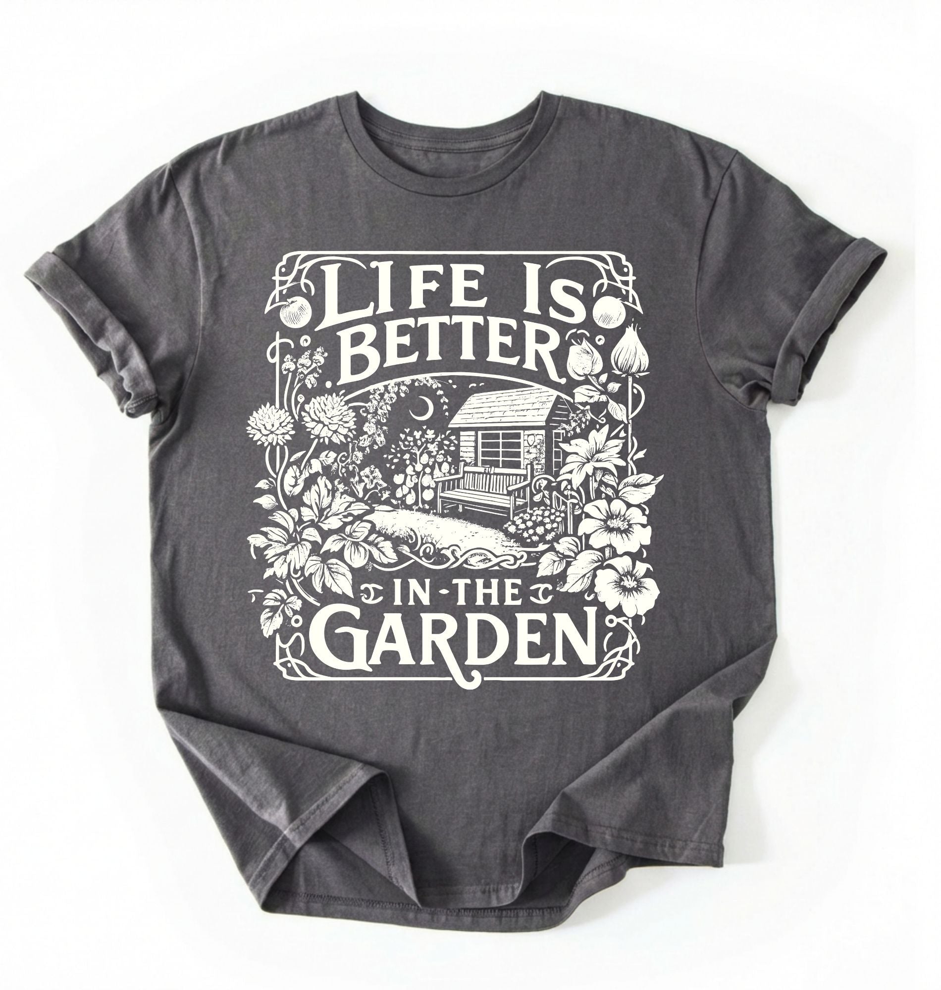 Flat lay of a Charcoal shirt written Life is better in the garden cottagecore t-shirt with vintage floral garden illustration, perfect gardener gift on a white background