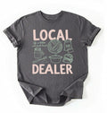 Flat lay of a Charcoal Funny local dealer bread shirt with baking tools and sourdough theme perfect gift for bakers and bread lovers on a white background 