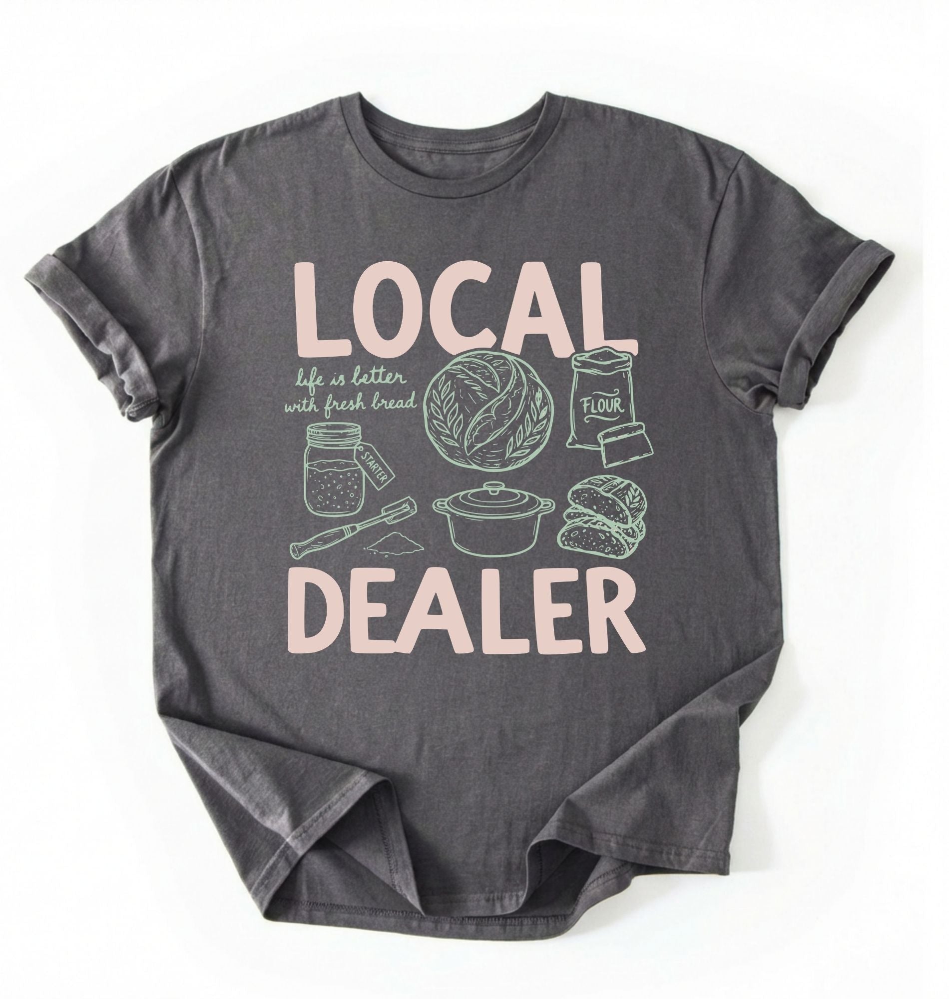 Flat lay of a Charcoal Funny local dealer bread shirt with baking tools and sourdough theme perfect gift for bakers and bread lovers on a white background 