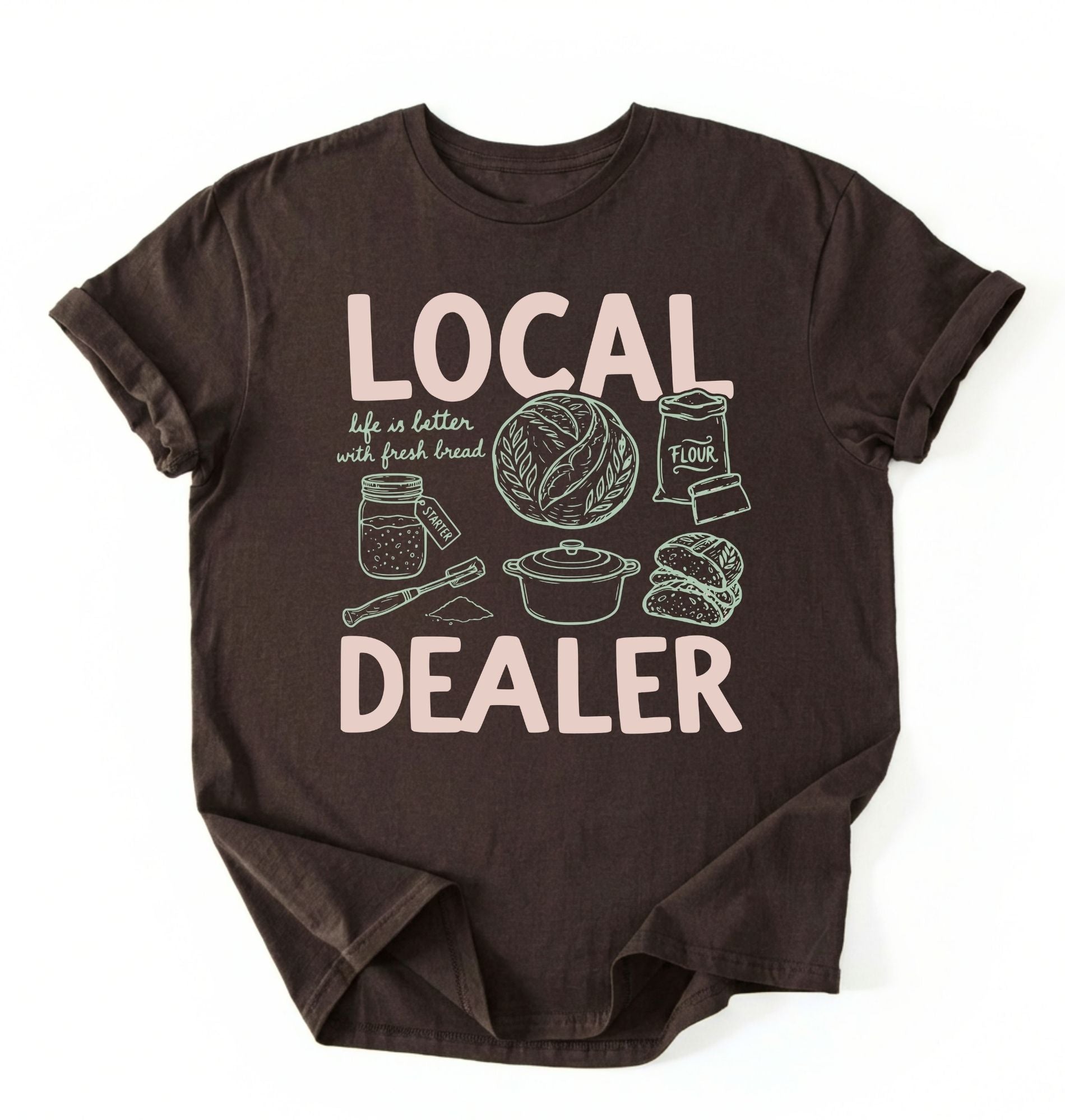 Flat lay of a dark chocolate Funny local dealer bread shirt with baking tools and sourdough theme perfect gift for bakers and bread lovers on a white background 