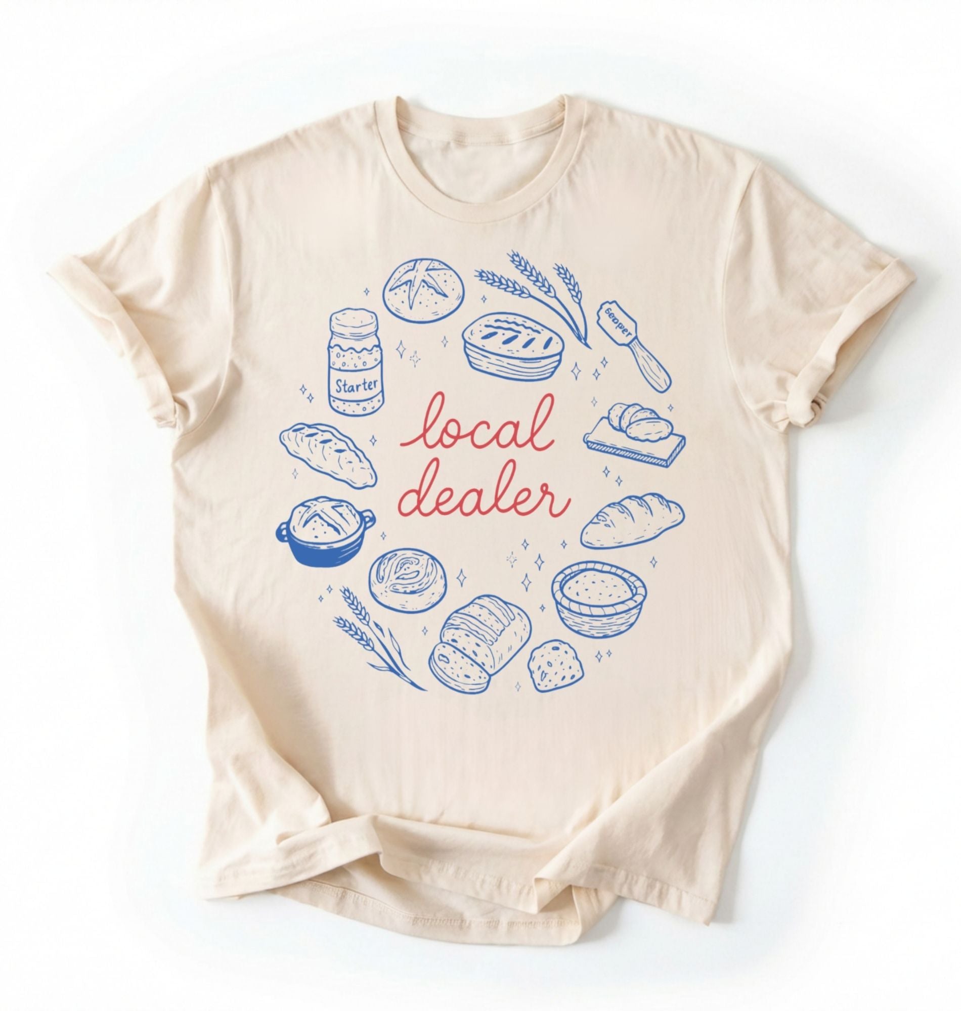 Flat lay of an ivory local dealer sourdough shirt with bread starter and baking illustrations funny baker gift white t-shirt on a white background