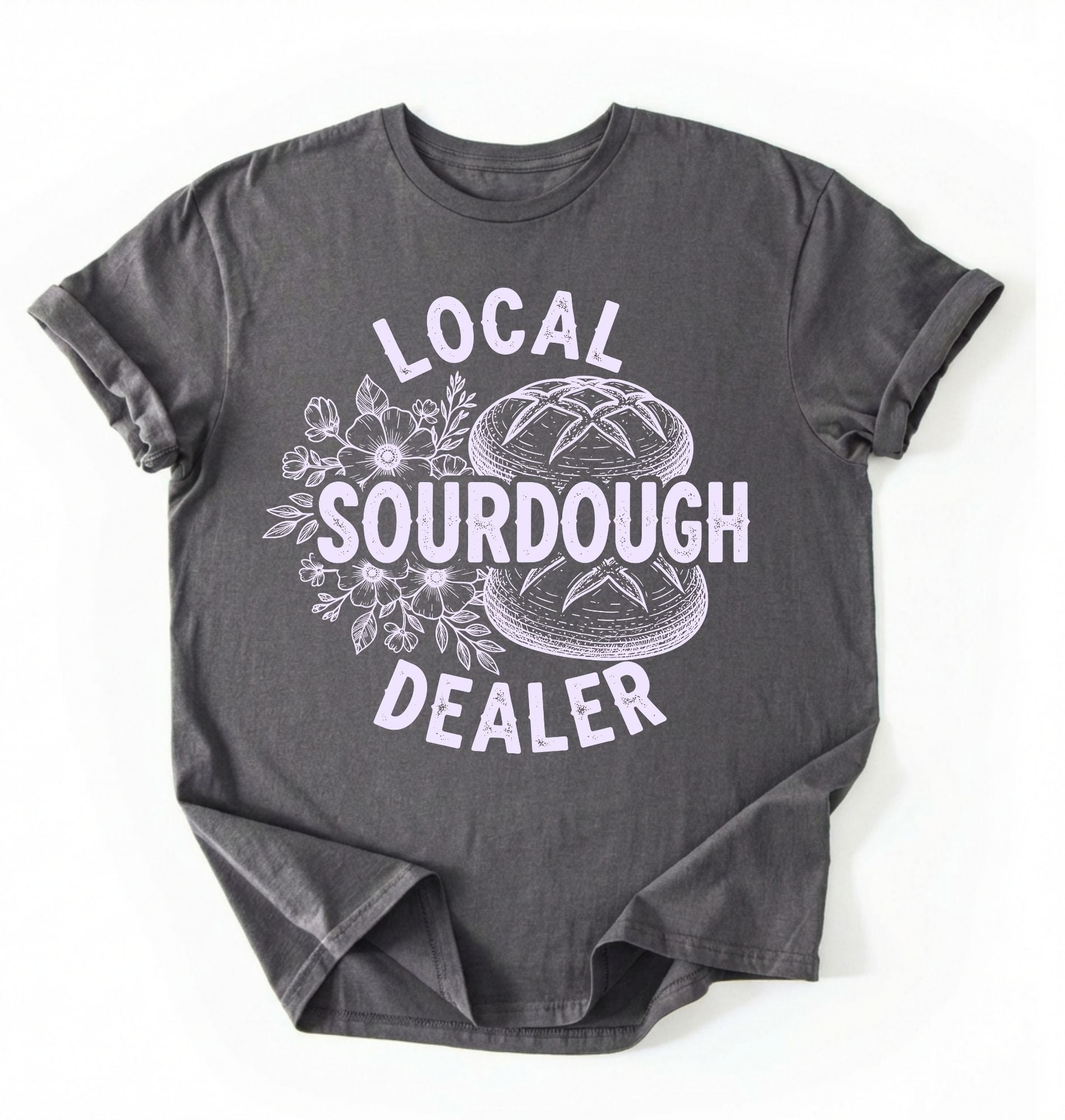 Flat lay of a charcoal local sourdough dealer shirt brown funny baking t shirt bread lover gift bakery humor on a white background 
