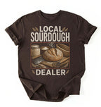 Flat lay of a dark chocolate local sourdough dealer shirt black funny baking t shirt bread lover gift vintage bakery style on a white background 