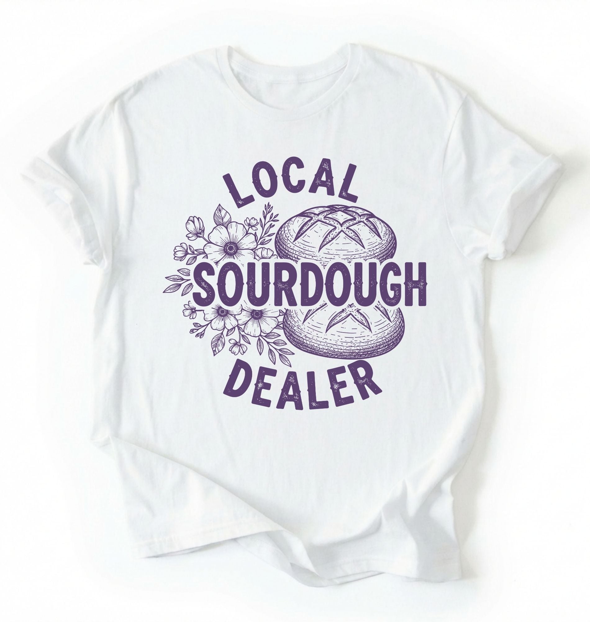 Flat lay of a white local sourdough dealer shirt brown funny baking t shirt bread lover gift bakery humor on a white background 