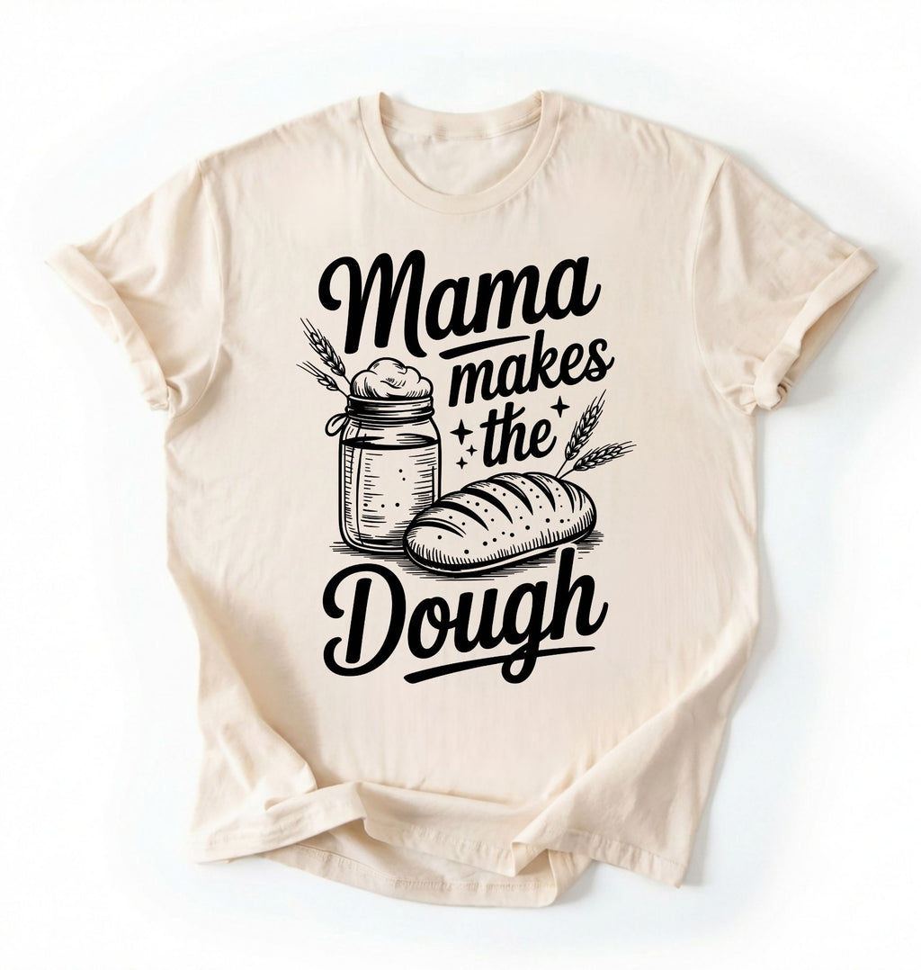 Flay lay of a green Mama makes the dough shirt with bread and jar illustration funny baking mom gift white t-shirt on a white background