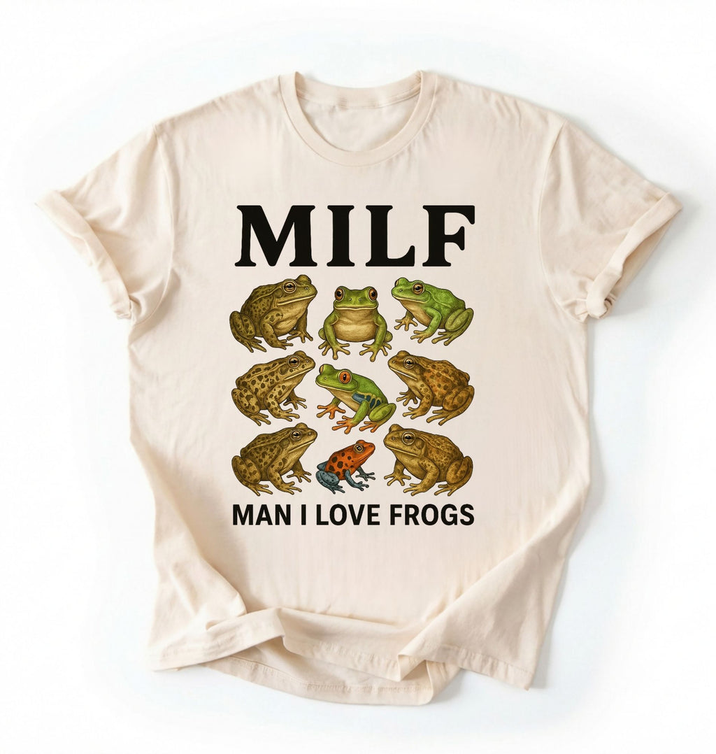 Flat lay of a Natural ivory Funny MILF frog shirt with illustrated frogs and Man I Love Frogs text graphic tee on a white background 