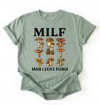 Flat lay of a Funny MILF mushroom shirt with illustrated fungi design gardener gift tee on a white background 