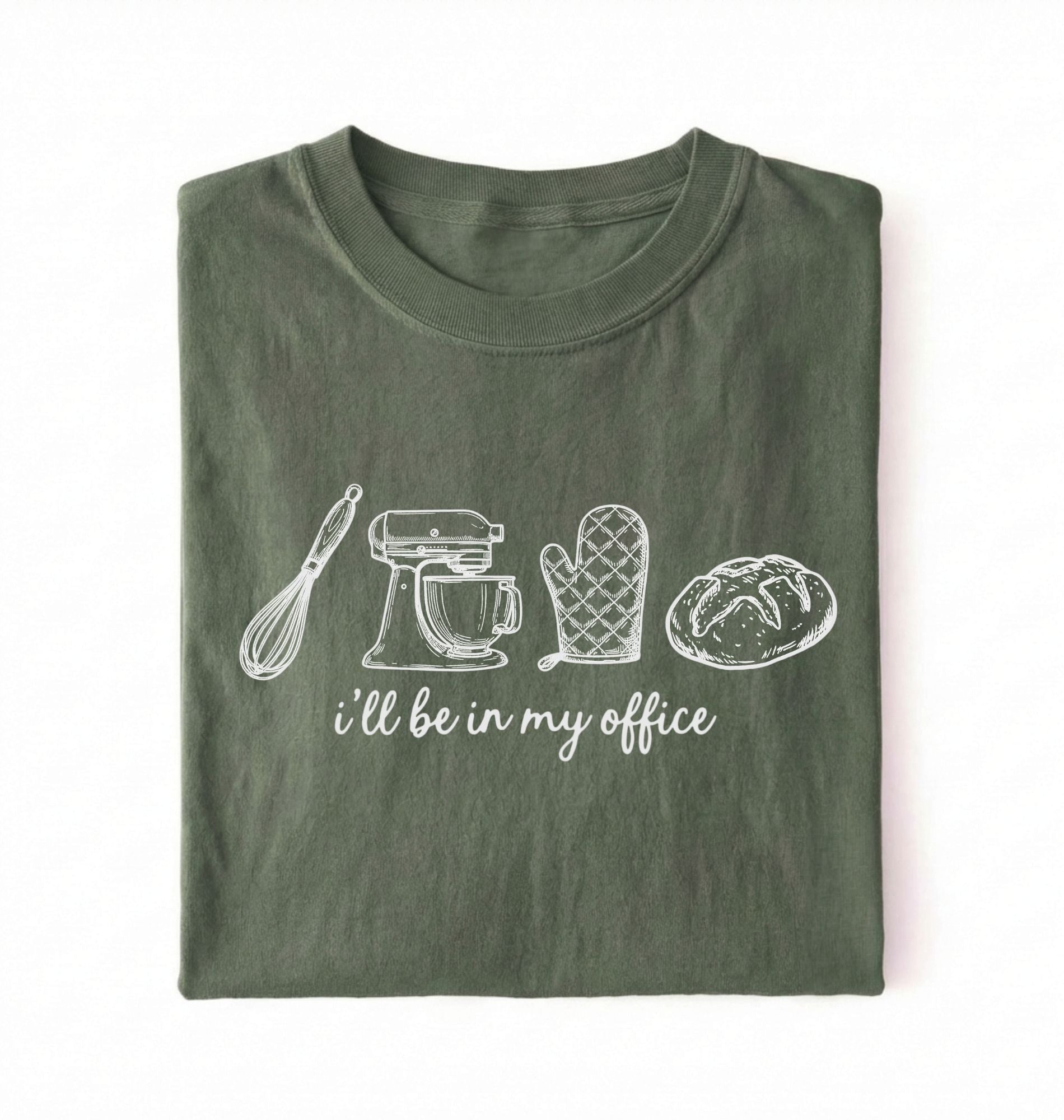 Flat lay of an ivory Minimalist baking shirt with kitchen tools line art and ill be in my office text perfect gift for bakers on a white background 