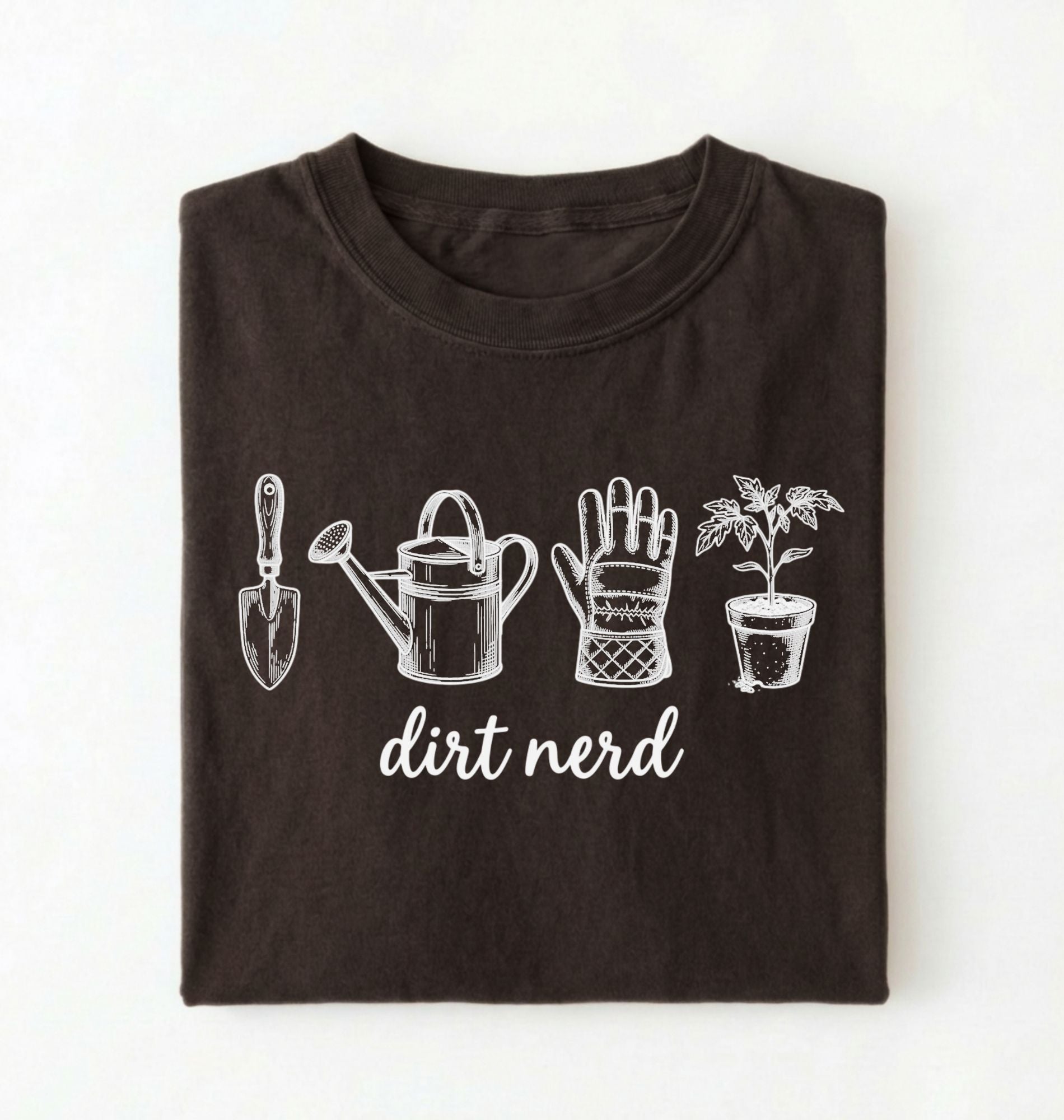 Flat lay of a dark chocolate Minimalist dirt nerd shirt with garden tools design perfect gift for plant lovers and gardeners on a white background