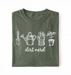 Flat lay of an military green Minimalist dirt nerd shirt with garden tools design perfect gift for plant lovers and gardeners on a white background