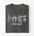 Flat lay of a pepper Minimalist dirt nerd shirt with garden tools design perfect gift for plant lovers and gardeners on a white background