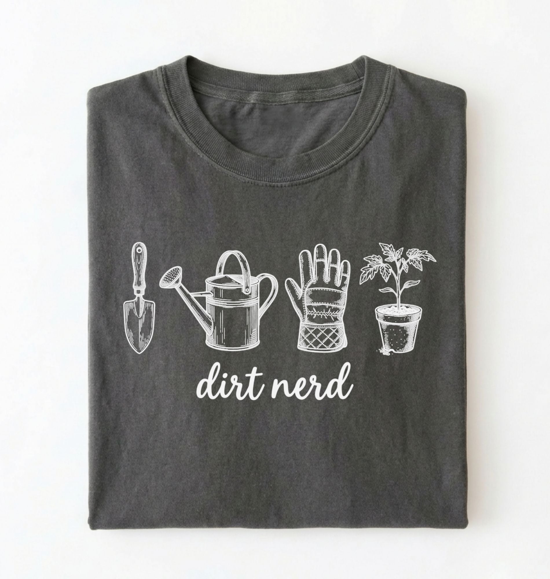 Flat lay of a pepper Minimalist dirt nerd shirt with garden tools design perfect gift for plant lovers and gardeners on a white background