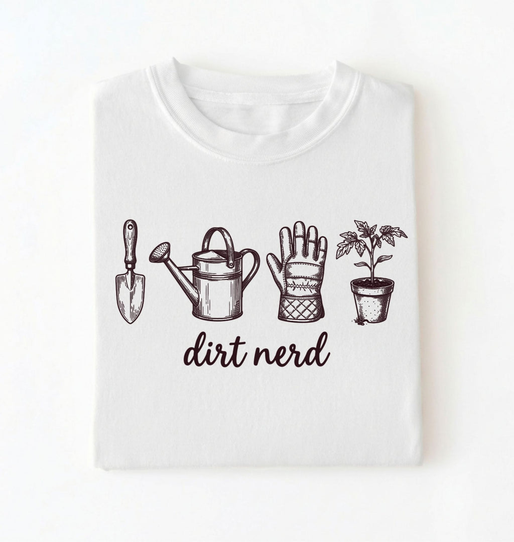 Flat lay of a white Minimalist dirt nerd shirt with garden tools design perfect gift for plant lovers and gardeners on a white background