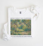 Flat lay of a white crewneck sweatshirt on a white background, featuring an impressionist floral garden artwork and black text reading “Money doesn’t buy happiness, but it buys plants, so close enough.