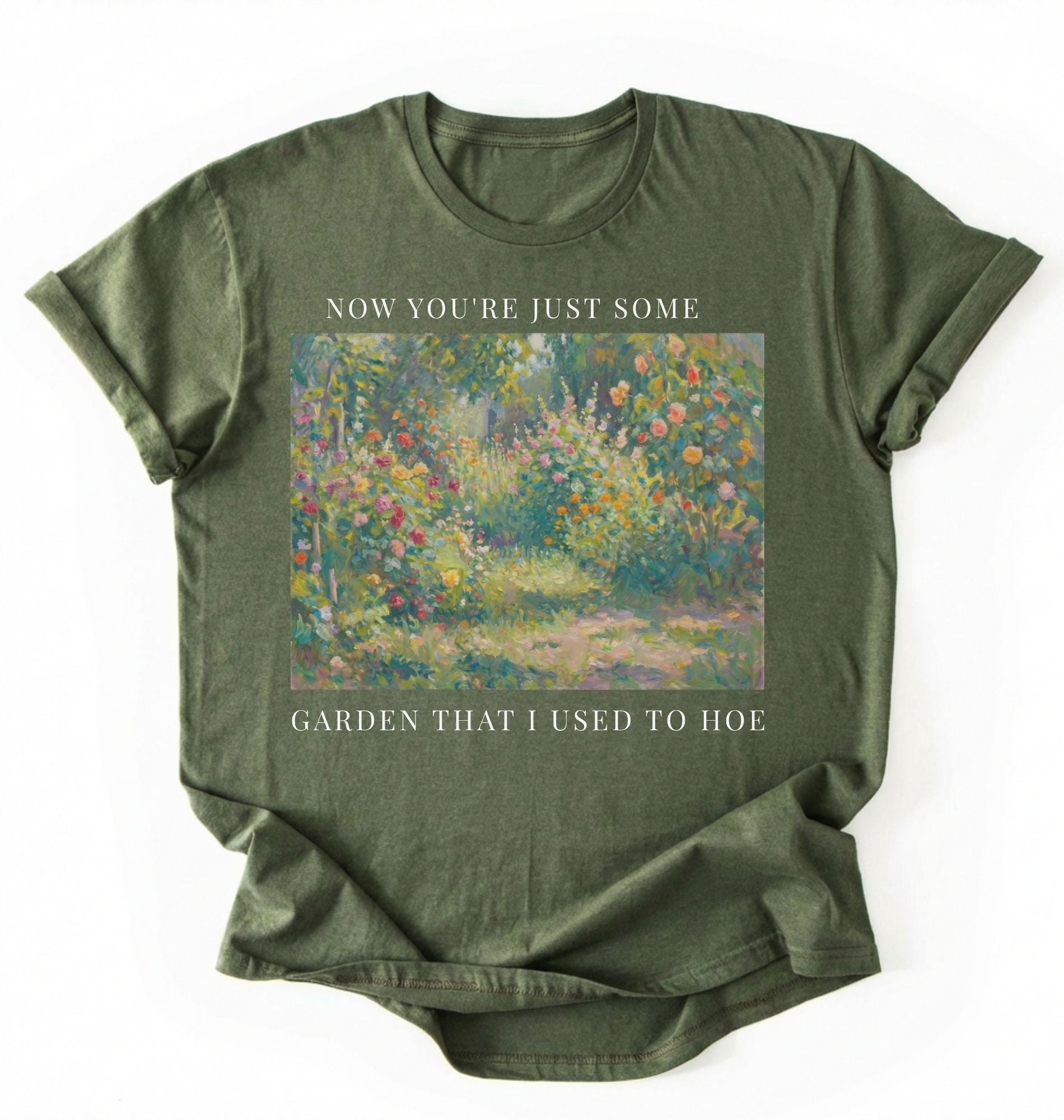 Flat lay of a green shirt written Now you’re just some garden t-shirt with funny gardening pun, perfect gardener gift on a white background
