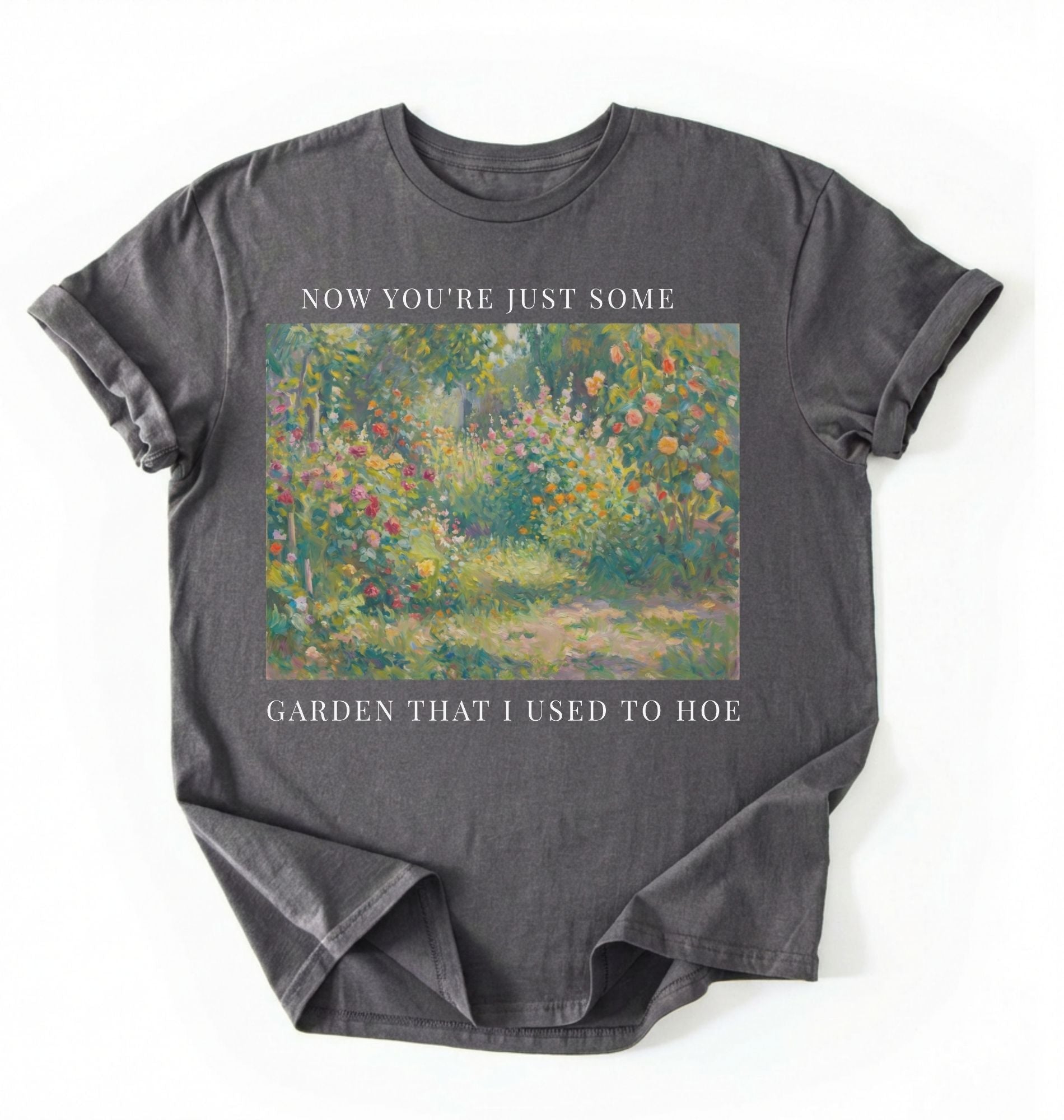 Flat lay of a pepper shirt written Now you’re just some garden t-shirt with funny gardening pun, perfect gardener gift on a white background