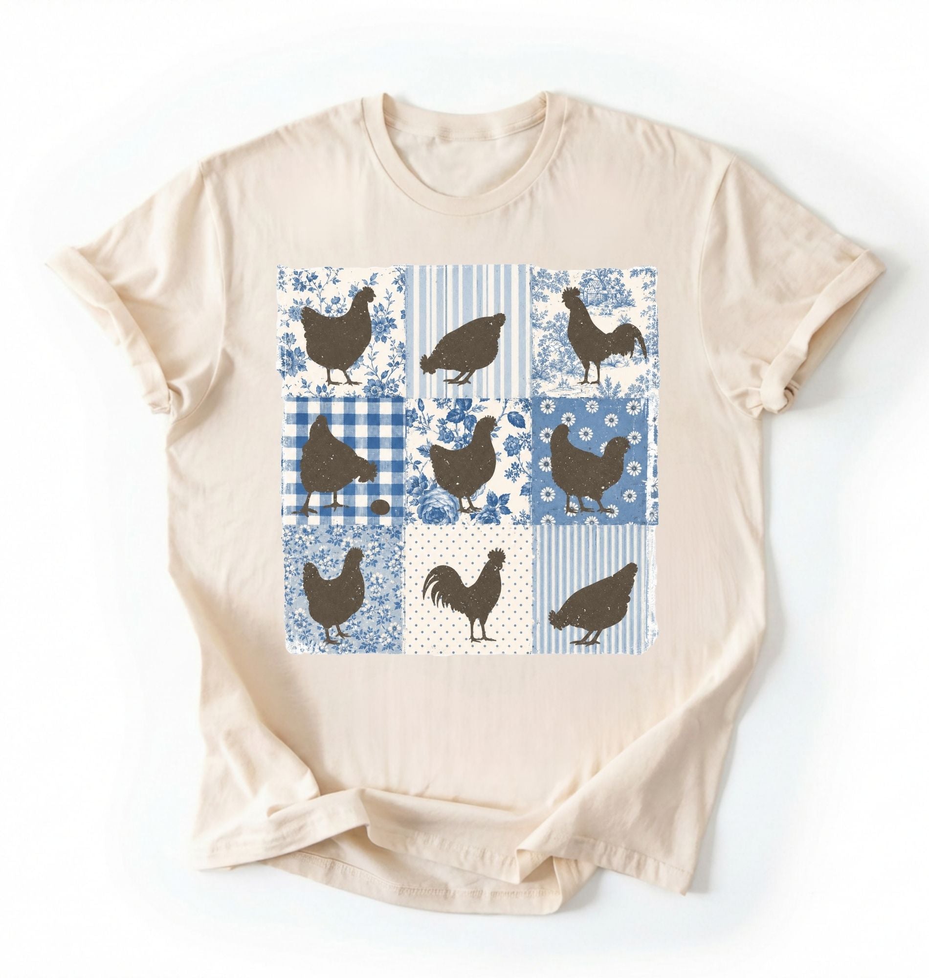 Flat lay of an ivory patchwork chicken shirt grey cottagecore chicken lover t shirt farmhouse aesthetic gift design on a white background