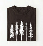 Flat lay of an Espresso t-shirt with white pine tree forest graphic, minimalist nature design for hiking and outdoor lovers on a white background 