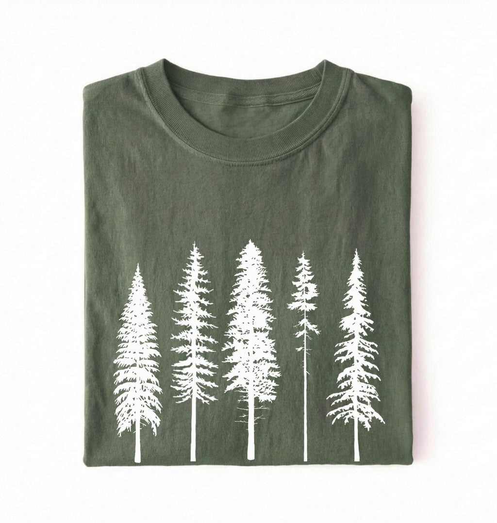 Flat lay of an moss t-shirt with white pine tree forest graphic, minimalist nature design for hiking and outdoor lovers on a white background