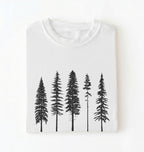 Flat lay of a white t-shirt with white pine tree forest graphic, minimalist nature design for hiking and outdoor lovers on a white background 