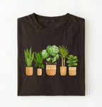 Flat lay of a dark_chocolate Houseplant lineup t-shirt with illustrated potted plants, cozy ivory tee, perfect gift for plant lovers on a white background 