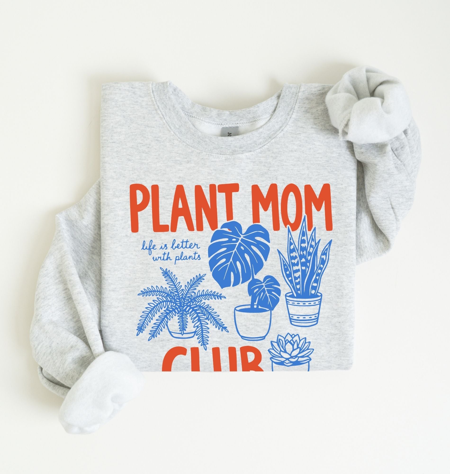 Flat lay of a ash green Plant mom club sweatshirt with houseplant illustrations perfect gift for plant lovers and indoor plant enthusiasts on a white background