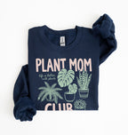 Flat lay of a forest green Plant mom club sweatshirt with houseplant illustrations perfect gift for plant lovers and indoor plant enthusiasts on a white background