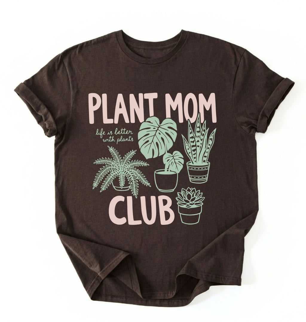 flat lay Plant Mom Club t-shirt with illustrated houseplants, perfect plant lover and gardener gift on a white background