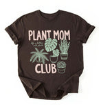 flat lay Plant Mom Club t-shirt with illustrated houseplants, perfect plant lover and gardener gift on a white background