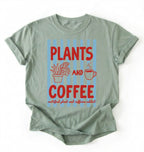 Flat lay of a Bay_Sage t-shirt featuring plant illustrations and a coffee cup with text reading “Plants and Coffee.” with retro stripes plant lover gift white graphic tee for coffee drinker and houseplant enthusiast on a white background 