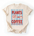 Flat lay of a Natural ivory t-shirt featuring plant illustrations and a coffee cup with text reading “Plants and Coffee.” with retro stripes plant lover gift white graphic tee for coffee drinker and houseplant enthusiast on a white background 
