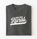 Flat lay of a Raise Them Rural country graphic shirt on pepper tee for farm families and rural lifestyle lovers on a white background 