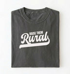 Flat lay of a Raise Them Rural country graphic shirt on pepper tee for farm families and rural lifestyle lovers on a white background 
