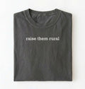 Flat lay of a Raise Them Rural country graphic shirt in charcoal for farm families rural lifestyle and country living on a white background