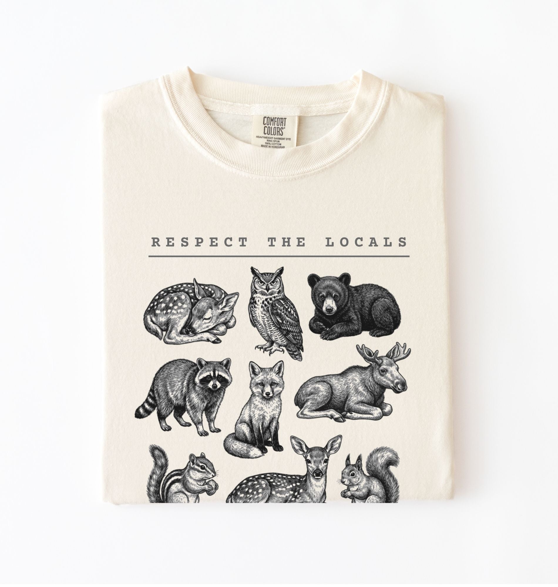 Respect the Locals forest animals shirt with vintage wildlife illustrations on a ivory t-shirt