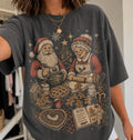 Pepper Christmas baking shirt featuring Santa and Mrs Claus making gingerbread cookies and pies with festive kitchen supplies