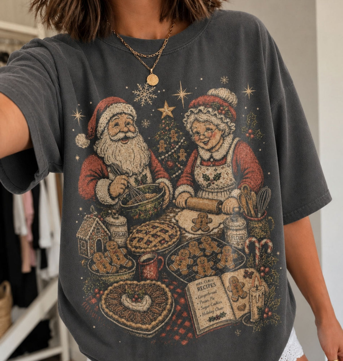 Pepper Christmas baking shirt featuring Santa and Mrs Claus making gingerbread cookies and pies with festive kitchen supplies